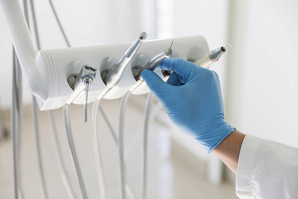Professional Tooth Extraction technician working in Houston, TX